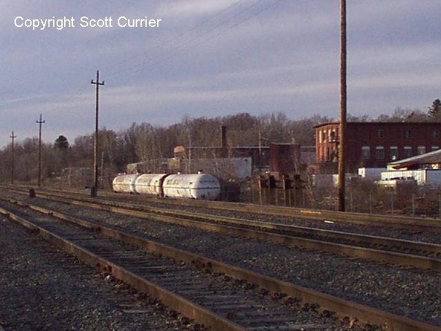 Those tank cars were there for a LONG time. Haverhill. 